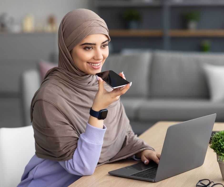 A person using voice commands to search online, reflecting the integration of voice tech in daily life.